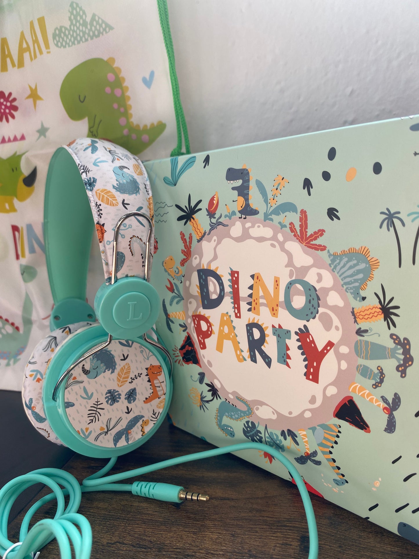 Auricular infantil con mochila diseño dinosaurio